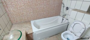 Bathroom in 3 BHK Apartment at Unitech Uniworld Gardens, Sector 47 – for Rent
