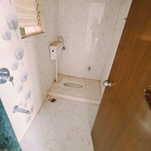 Bathroom in 2 BHK Apartment at Gulmohor Imperial, Dhayari – for Sale