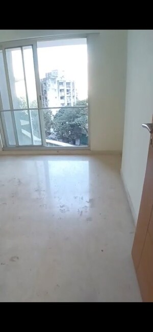 Room in 2 BHK Apartment at Ekta Tripolis, Goregaon West – for Sale
