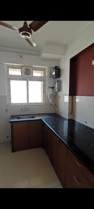 Kitchen in 2 BHK Apartment at Hiranandani Villa Grand, Ghodbunder Road – for Rent