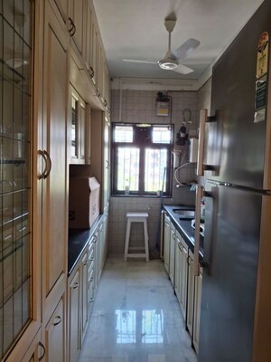 Kitchen in 3 BHK Apartment at Felicia Apartment, Pali Hill – for Rent