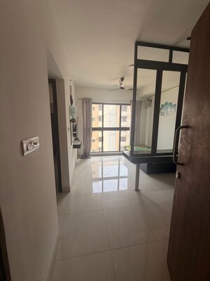 Living Room in 1 BHK Apartment at Lodha Crown Quality Homes, Majiwada – for Rent