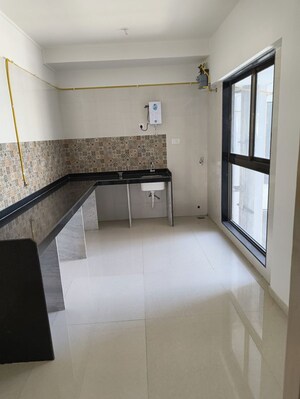 Kitchen in 4 BHK Apartment at Rajesh Raj Infinia, Malad West – for Rent