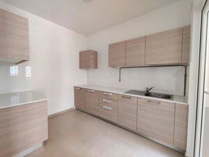 Kitchen in 3 BHK Apartment at Bhartiya Nikoo Homes Phase 2, Thanisandra Main Road – for Sale