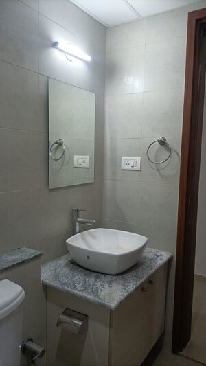 Bathroom in 3 BHK Apartment at Bhartiya Nikoo Homes Phase 2, Thanisandra Main Road – for Sale