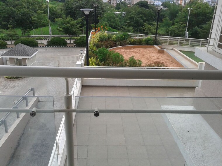 Balcony, paranjape-forest-trails-pebbles 2 Bedroom 950 Sq.Ft. Apartment In Bhugaon Pune 10131482