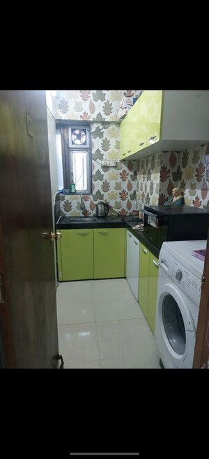 Kitchen in 2 BHK Apartment at Veena Nagar CHS Malad, Malad West – for Rent