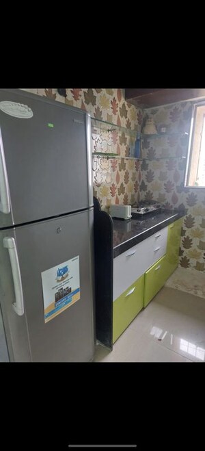 Kitchen in 2 BHK Apartment at Veena Nagar CHS Malad, Malad West – for Rent