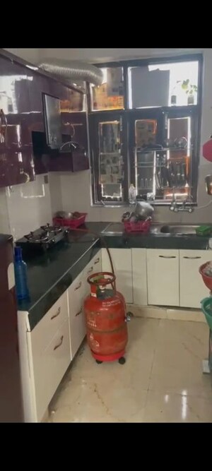 Kitchen in 2 BHK Apartment at Raj Nagar Extension – for Rent