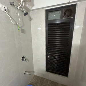 Bathroom in 1 BHK Apartment at Marathon Neo Square, Tulshet Pada – for Rent