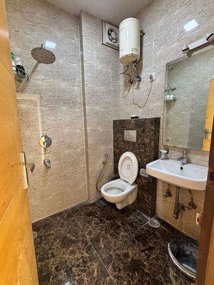 Bathroom in 4 BHK Builder Floor at East Of Kailash – for Rent