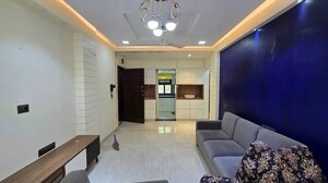 Living Room in 2 BHK Apartment at Atlanta CHS, Malad West – for Rent