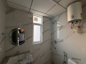 Bathroom in 2 BHK Builder Floor at Vatika India Next Floors, Sector 82 – for Rent