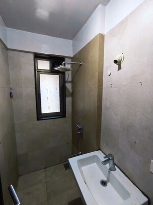 Bathroom in 2 BHK Apartment at Runwal Symphony, Santacruz East – for Rent