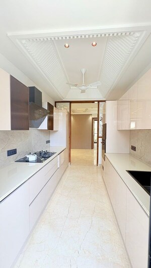 Kitchen in 4 BHK Builder Floor at Ansal API Esencia, Sector 67 – for Sale