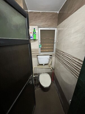 Bathroom in 2 BHK Apartment at Jasmine Tower, Vasant Vihar – for Rent