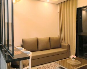 Living Room in 1 BHK Apartment at Lodha Crown Quality Homes, Majiwada – for Rent