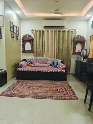 Living Room in 2 BHK Apartment at KM Horizon Flora, Ghodbunder Road – for Rent