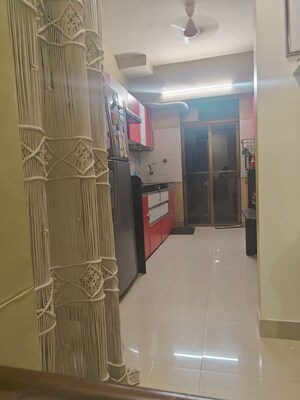 Kitchen in 2 BHK Apartment at KM Horizon Flora, Ghodbunder Road – for Rent