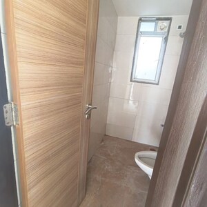 Bathroom in 2 BHK Apartment at Ekta Tripolis, Goregaon West – for Rent