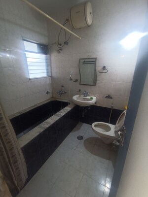 Bathroom in 3 BHK Apartment at Vikas Park CHS, Malad West – for Rent