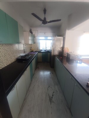 Kitchen in 3 BHK Apartment at Vikas Park CHS, Malad West – for Rent