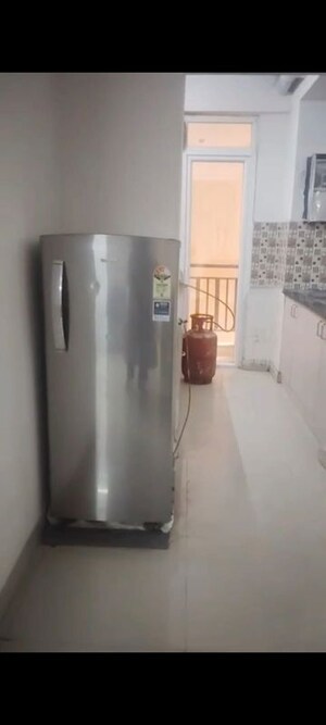 Building Lobby in 2 BHK Apartment at AIMS Golf Town, Sector 4 Greater Noida – for Rent