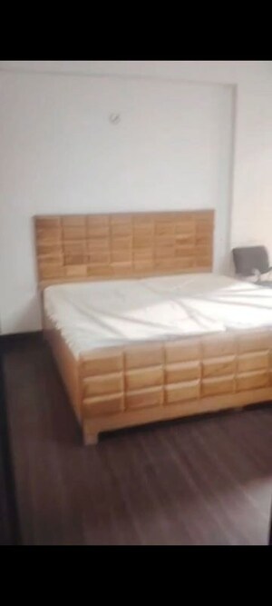 Bedroom in 2 BHK Apartment at AIMS Golf Town, Sector 4 Greater Noida – for Rent