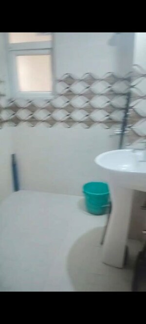 Bathroom in 2 BHK Apartment at AIMS Golf Town, Sector 4 Greater Noida – for Rent
