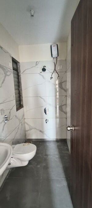 Bathroom in 1 BHK Apartment at Raunak City, Kalyan West – for Sale