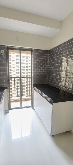 Kitchen in 1 BHK Apartment at Raunak City, Kalyan West – for Sale