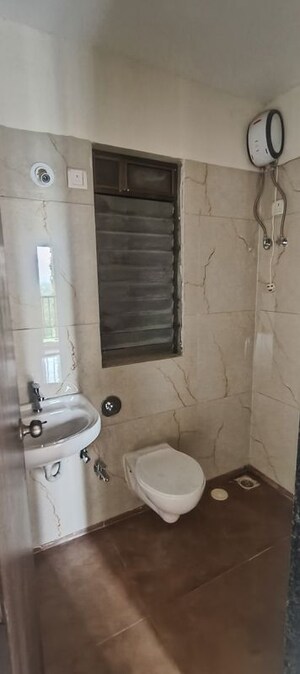 Bathroom in 1 BHK Apartment at Raunak City, Kalyan West – for Sale