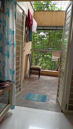 Terrace in 2 BHK Apartment at Vyas Anudatta CHS, Rambaug Colony – for Rent