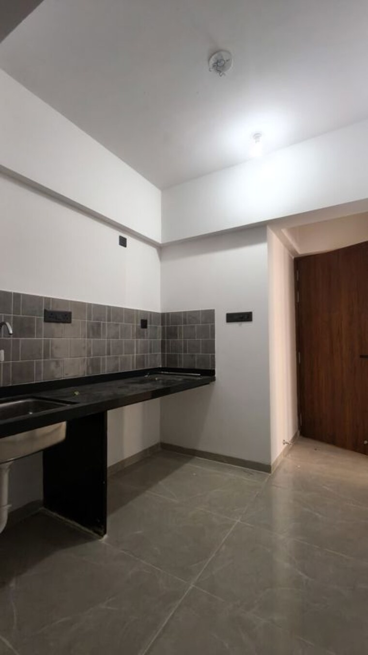 Kitchen, pristine-allure 2 Bedroom 782 Sq.Ft. Apartment In Kharadi Pune 10157692