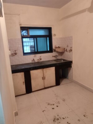 Kitchen in 1 BHK Apartment at Unique Nirmal Nagari, Khardipada – for Sale