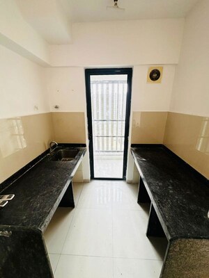 Staircase in 1 BHK Apartment at Lodha Palava Downtown, Dombivli East – for Rent