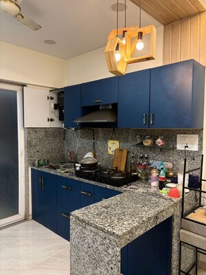 Kitchen in 2 BHK Apartment at Oxford Florida Riverwalk, Mundhwa – for Rent