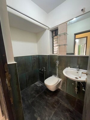 Master Bedroom in 2 BHK Apartment at Aalind Link Palace CHS, Goregaon East – for Rent