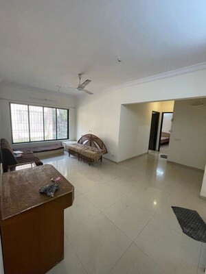 Living Room in 2 BHK Apartment at Aalind Link Palace CHS, Goregaon East – for Rent