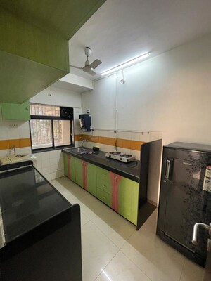 Kitchen in 2 BHK Apartment at Aalind Link Palace CHS, Goregaon East – for Rent