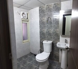 Bathroom in 2 BHK Apartment at JKG Palm Court, Sector 16c Greater Noida – for Rent