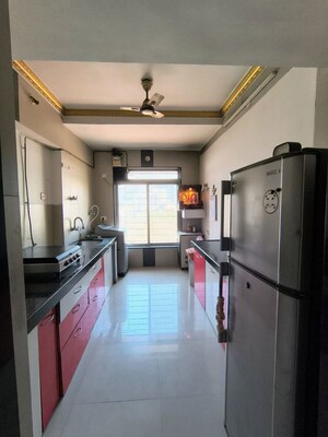 Kitchen in 2 BHK Apartment at Soham Garden, Manpada – for Rent