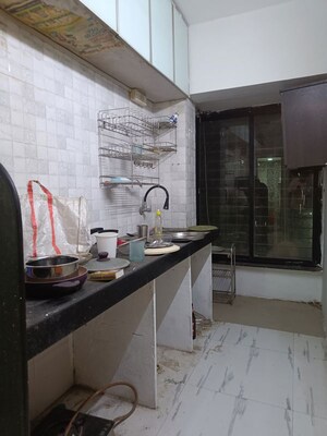 Kitchen in Studio Apartment at Royal Palms Garden View, Goregaon East – for Sale