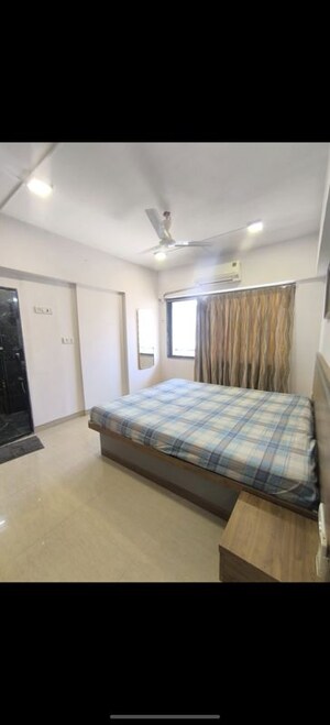Bedroom in 2 BHK Apartment at Evershine CHS Malad, Malad West – for Rent