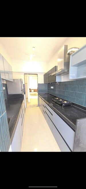 Kitchen in 2 BHK Apartment at Evershine CHS Malad, Malad West – for Rent