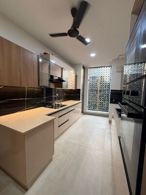 Kitchen in 4 BHK Apartment at Sushant Lok I – for Sale