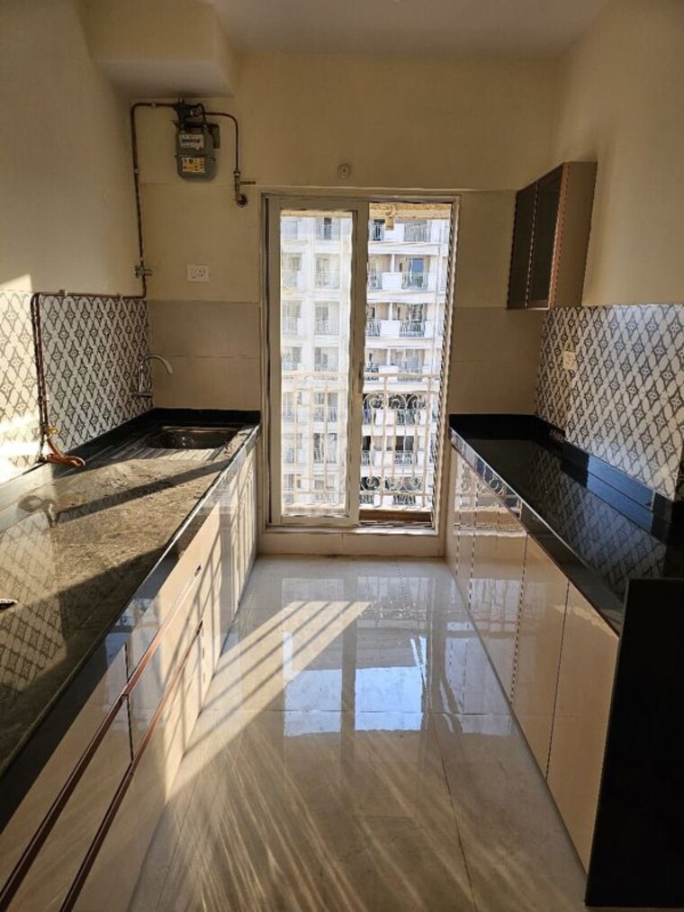 Kitchen, shree-tirupati-stg-signature-residency 2 Bedroom 740 Sq.Ft. Apartment In Patlipada Thane 10158321