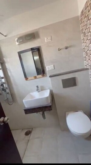 Bathroom in 4 BHK Apartment at Ajnara Grace, Raj Nagar Extension – for Rent
