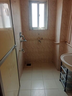 Bathroom in 1 BHK Apartment at Royal Palms Diamond Isle Phase III, Goregaon East – for Sale
