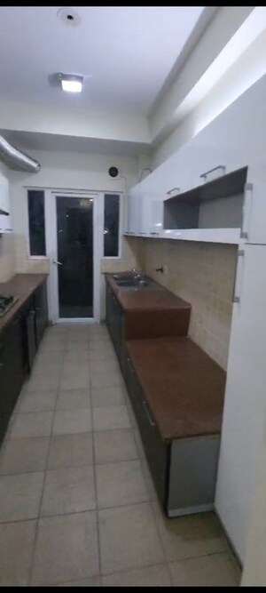 Kitchen in 3.5 BHK Apartment at Mahagun Moderne, Sector 78 – for Rent